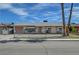 Charming single-story home with a gravel yard and mature palm trees at 4067 E Colorado Ave, Las Vegas, NV 89104
