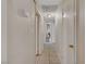 A bright hallway with tile flooring leads to various rooms in the house at 4067 E Colorado Ave, Las Vegas, NV 89104