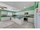 Bright kitchen with white cabinetry, stainless steel appliances, and a large island at 4067 E Colorado Ave, Las Vegas, NV 89104