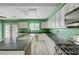 Bright kitchen featuring a large island, gas range, and ample countertop space at 4067 E Colorado Ave, Las Vegas, NV 89104