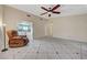 Inviting living room features tile flooring and a comfortable recliner at 4067 E Colorado Ave, Las Vegas, NV 89104