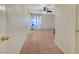Open-concept living room with a ceiling fan and tiled flooring at 4067 E Colorado Ave, Las Vegas, NV 89104