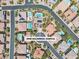 Comprehensive aerial view showcasing the property, landscaping, pool, solar panels, and neighborhood layout at 4196 Balmoral Castle Ct, Las Vegas, NV 89141