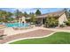 A stunning backyard features a pristine pool and spa, and ample space for outdoor lounging at 4196 Balmoral Castle Ct, Las Vegas, NV 89141