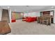 Finished basement with home theater, custom bar, and comfortable seating area at 4196 Balmoral Castle Ct, Las Vegas, NV 89141