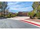 Attractive one-story home featuring a three-car garage, solar panels, and professionally landscaped grounds at 4196 Balmoral Castle Ct, Las Vegas, NV 89141