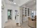 Bright office space features built-in shelves, plenty of natural light, and a neutral color palette at 4196 Balmoral Castle Ct, Las Vegas, NV 89141