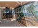 A custom outdoor patio adorned with artful murals, alongside a winding staircase at 4196 Balmoral Castle Ct, Las Vegas, NV 89141