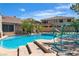 Stunning backyard pool with adjacent spa, perfect for relaxation and outdoor entertaining at 4196 Balmoral Castle Ct, Las Vegas, NV 89141