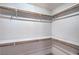 Spacious walk-in closet offers ample storage with shelving and closet rods at 4475 Harmony Ct, Las Vegas, NV 89121
