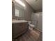 Well-maintained bathroom featuring a stylish vanity, a toilet, and a walk-in shower at 460 Elm Dr # 103, Las Vegas, NV 89169