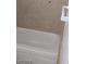 Clean bathtub with neutral tile surround and a streamlined design at 4760 Woodridge Rd, Las Vegas, NV 89121