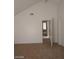 Bedroom with a view of an open doorway and vaulted ceilings at 4760 Woodridge Rd, Las Vegas, NV 89121