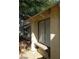 Exterior shot showing textured stucco and an exterior window at 4760 Woodridge Rd, Las Vegas, NV 89121