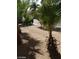 Easy care desert landscaping and rock in the front yard at 4760 Woodridge Rd, Las Vegas, NV 89121
