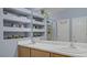 Bathroom with a double vanity, white countertops, and modern fixtures, providing ample space at 482 Painted Sage Ct, Henderson, NV 89015