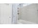 Bathroom with shower and tub combination featuring white tiled walls at 482 Painted Sage Ct, Henderson, NV 89015