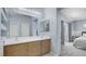 Bathroom view showing double vanity and bedroom, connecting spaces in the home at 482 Painted Sage Ct, Henderson, NV 89015
