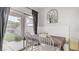 Bright dining area featuring sliding glass doors to the outdoor living space at 482 Painted Sage Ct, Henderson, NV 89015