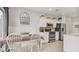 Bright, sunlit kitchen with an adjacent dining area with decor and stainless steel appliances at 482 Painted Sage Ct, Henderson, NV 89015