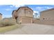 Charming two-story home featuring a two-car garage and well-maintained front yard landscaping at 482 Painted Sage Ct, Henderson, NV 89015
