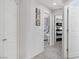 Hallway view with multiple doorways providing access to other rooms in the home at 482 Painted Sage Ct, Henderson, NV 89015