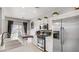 Bright kitchen with stainless steel appliances and a view to the outdoor patio at 482 Painted Sage Ct, Henderson, NV 89015