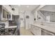 Updated kitchen features stainless steel appliances and access to upstairs at 482 Painted Sage Ct, Henderson, NV 89015