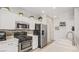 Well-equipped kitchen boasts stainless steel appliances and adjacent pantry at 482 Painted Sage Ct, Henderson, NV 89015