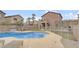 Beautiful backyard with pool, hot tub, and patio area at 482 Painted Sage Ct, Henderson, NV 89015