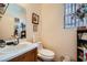 Functional bathroom with a single sink vanity and neutral tones at 4832 Englewood Ave, Las Vegas, NV 89139