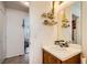 Well-lit bathroom featuring a vanity with ample storage and clean finishes at 4832 Englewood Ave, Las Vegas, NV 89139