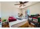 Bedroom with ceiling fan, window and carpet at 4832 Englewood Ave, Las Vegas, NV 89139