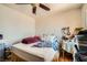 Bedroom featuring hard wood floors, ceiling fan and natural light at 4832 Englewood Ave, Las Vegas, NV 89139