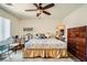 Bedroom featuring a ceiling fan, with natural light from a window at 4832 Englewood Ave, Las Vegas, NV 89139