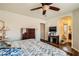 Bedroom featuring hard wood floors, and view to bathroom at 4832 Englewood Ave, Las Vegas, NV 89139