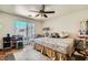 Bright bedroom with a ceiling fan and closet at 4832 Englewood Ave, Las Vegas, NV 89139