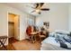 Bedroom with carpet, natural light, and a ceiling fan at 4832 Englewood Ave, Las Vegas, NV 89139