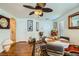 Bright dining area with wood flooring, a ceiling fan, and natural light at 4832 Englewood Ave, Las Vegas, NV 89139