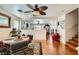 Dining area with an elegant rug and view of the living space and staircase at 4832 Englewood Ave, Las Vegas, NV 89139