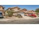 A suburban home with a desert landscape, a two-car garage, and a friendly neighborhood ambiance at 4832 Englewood Ave, Las Vegas, NV 89139