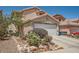 Attractive residence with desert-friendly landscaping, a two-car garage, and a peaceful neighborhood setting at 4832 Englewood Ave, Las Vegas, NV 89139