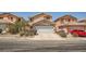 Lovely home with a well-kept lawn, and a two-car garage nestled in a quiet residential area at 4832 Englewood Ave, Las Vegas, NV 89139