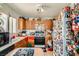 Charming kitchen featuring oak cabinets and essential appliances at 4832 Englewood Ave, Las Vegas, NV 89139