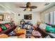 Inviting living room featuring a ceiling fan, perfect for relaxing at 4832 Englewood Ave, Las Vegas, NV 89139