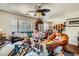 Bright living room featuring hardwood floors and ample natural light at 4832 Englewood Ave, Las Vegas, NV 89139