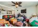 Cozy living room with ceiling fan, seamlessly blending comfort and style at 4832 Englewood Ave, Las Vegas, NV 89139
