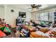 Comfortable living room with ceiling fan and a large window at 4832 Englewood Ave, Las Vegas, NV 89139