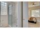Modern bathroom boasts glass shower, marble walls, and stylish fixtures at 4845 Santo Romeo St, Las Vegas, NV 89135