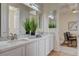 Bright bathroom featuring double vanity sinks, designed for a spa-like atmosphere at 4845 Santo Romeo St, Las Vegas, NV 89135